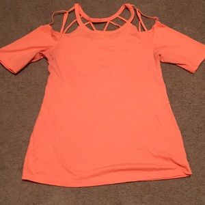 caged upper back and top or shoulder shirt